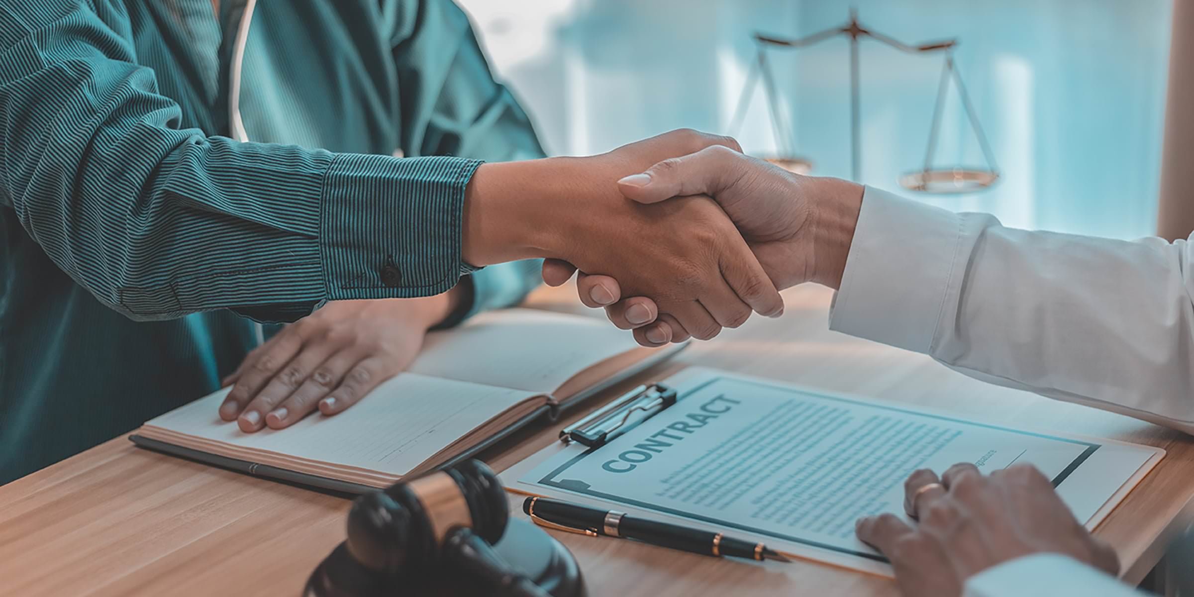 Businessman shaking hands with a lawyer or judge After signing the contract and the agreement is complete, Approval of an agreement between business and law, End of the legal case.