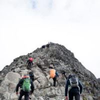 Group hiking mountain servant leadership